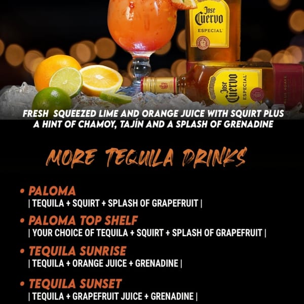 A vibrant orange cocktail with lime and orange slices, Jose Cuervo tequila bottles, and ice.