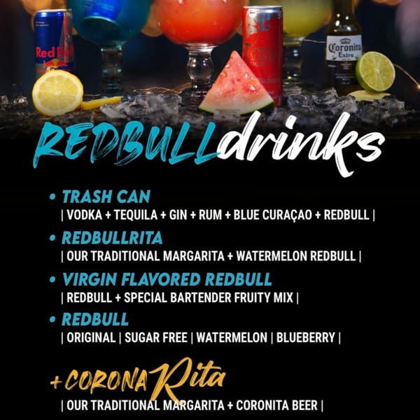 Red Bull drinks menu with cocktails, cans, and fruit garnishes on ice.